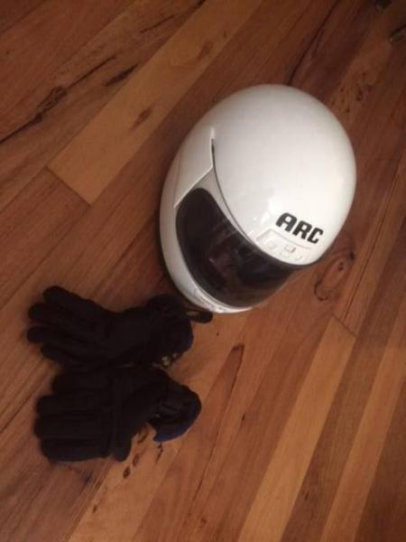 Small sized motorbike helmet and small gloves slightly used