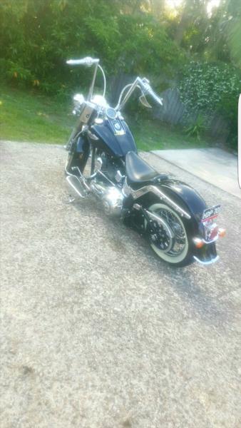 2010 softail deluxe. $22500 or swap for another custom harley