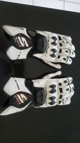 Five brand racing gloves new condition
