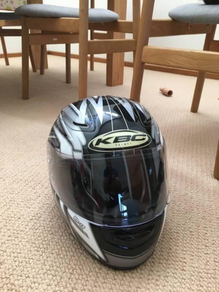 small KBC motorcycle helmet & female leather Dainese gloves