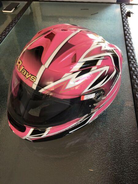 Pink motorcycle helmet