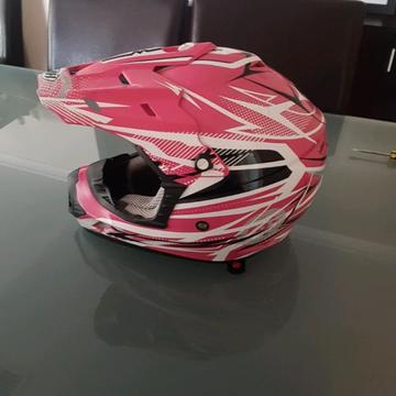 Pink motorbike helmet