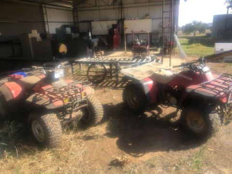 Two Honda four wheelers for sale