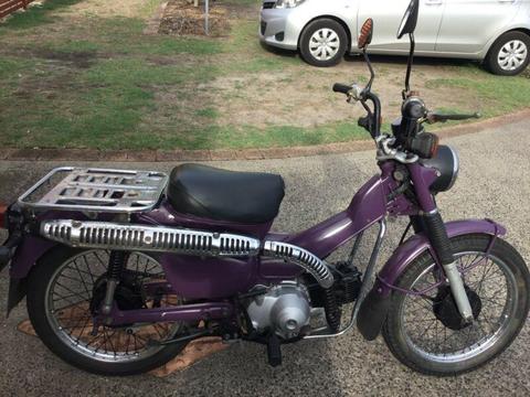 Purple postie bike