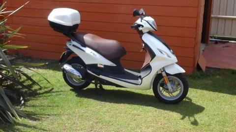 As new Piaggio Fly motor Scooter