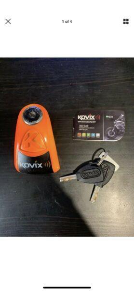 KOVIX - Disc Lock with 120db Alarm - Fluro Orange Motorcycle
