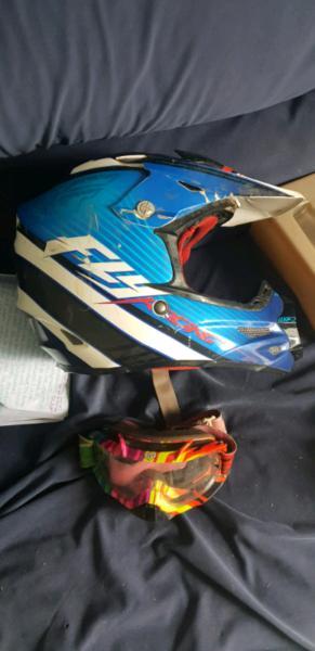 Fly motocross helmet and fox goggles