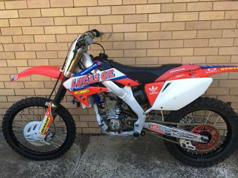 Crf250 fresh top end,ported head,exhaust system