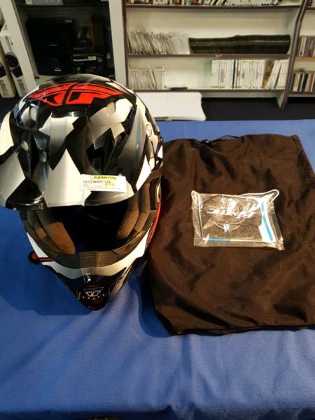Kinetic racing helmet in box