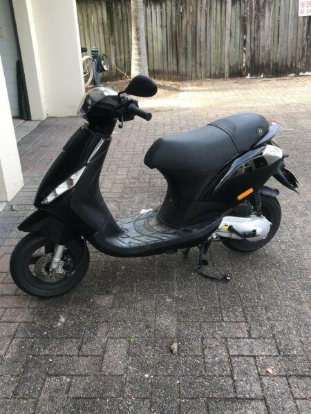 50cc scooter. Only need a car license!