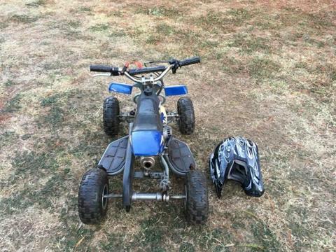 Youth quad in running condition with pullstart and helmet