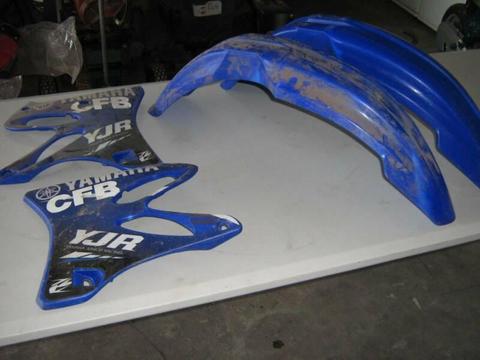 Yamaha YZ125 plastics shrouds and front guards may suit other models