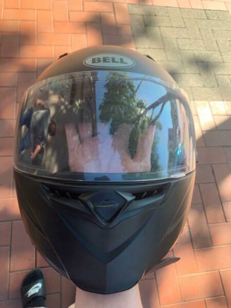 1 bell motorcycle helmet and 1 shoei open face motorcycle helmet