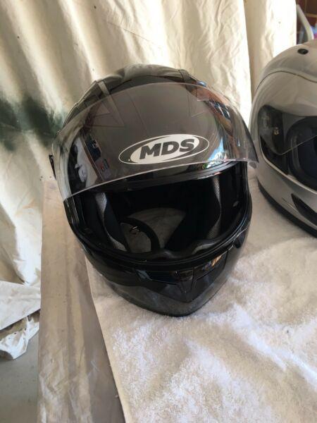 Motorcycle helmets, disk locks, gloves, leather carrier bags