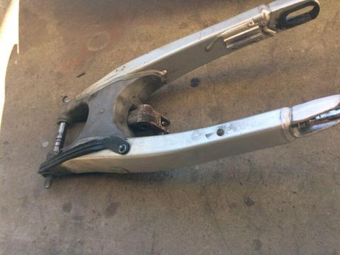 Swing arm and linkage