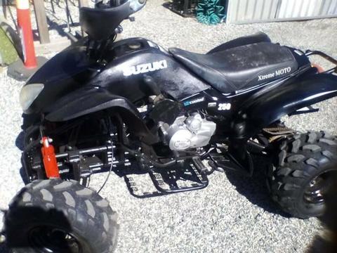 EXTREME MOTO 250cc QUAD WITH SUZUKI STICKERS, (reply text only)