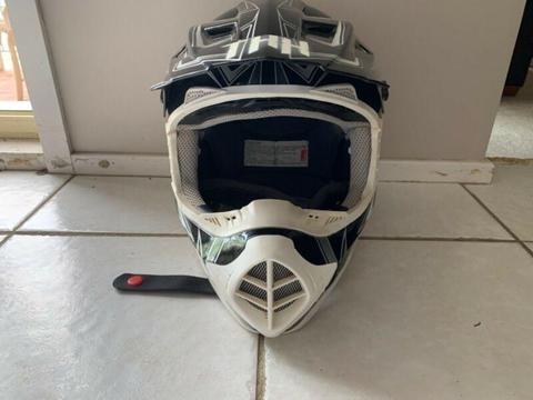 Small motorbike helmet and goggles