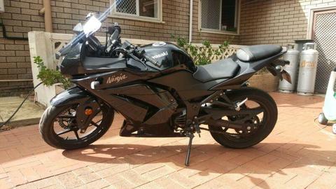 Kawasaki Ninja road bike. Excellent cond. Gone overseas so gotta sell
