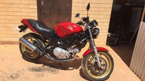 2005 red Honda vtr 250