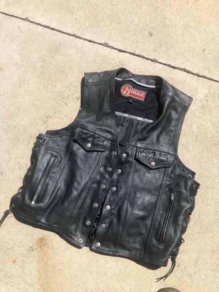 Harley Davidson leather vest also selling bike