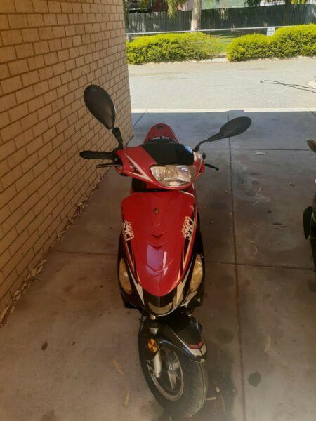 Red 50cc Riviera Moped