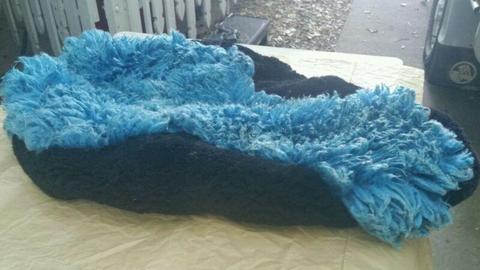 Mororbike sheepskin cover. Black and blue. Machine washable