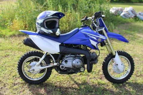 2010 TT-R50E Yamaha 50cc 4-stroke motorbike and Helmet $1500. Bin full